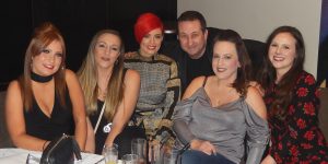 Andy Field Cheltenham close up magician performing with guests. Bringing laughter and wonder at every event