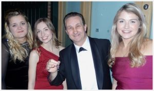 The magician in Bath links three womens rings together in a seamless illusion.