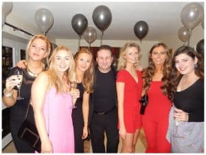 Magician Andy Field at a Gloucester party. With a group of ladies all enjoying the celebration