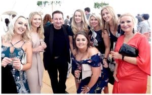 Andy Field Swindon magician with a group of guests after performing close-up magic