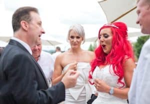 Gloucester wedding magician performing close up magic to a bride on her wedding day