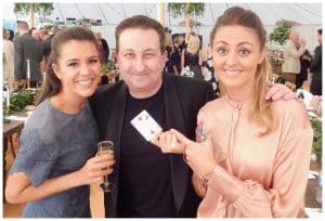 Andy Field Swindon magician with guests after performing close-up magic at an event