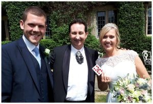 Andy Field Magician performing sleight of hand for the bride and groom adding a personal touch to their Big Day