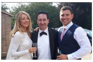 Andy Field close up magician performing between the Bride and Groom at their Gloucester wedding