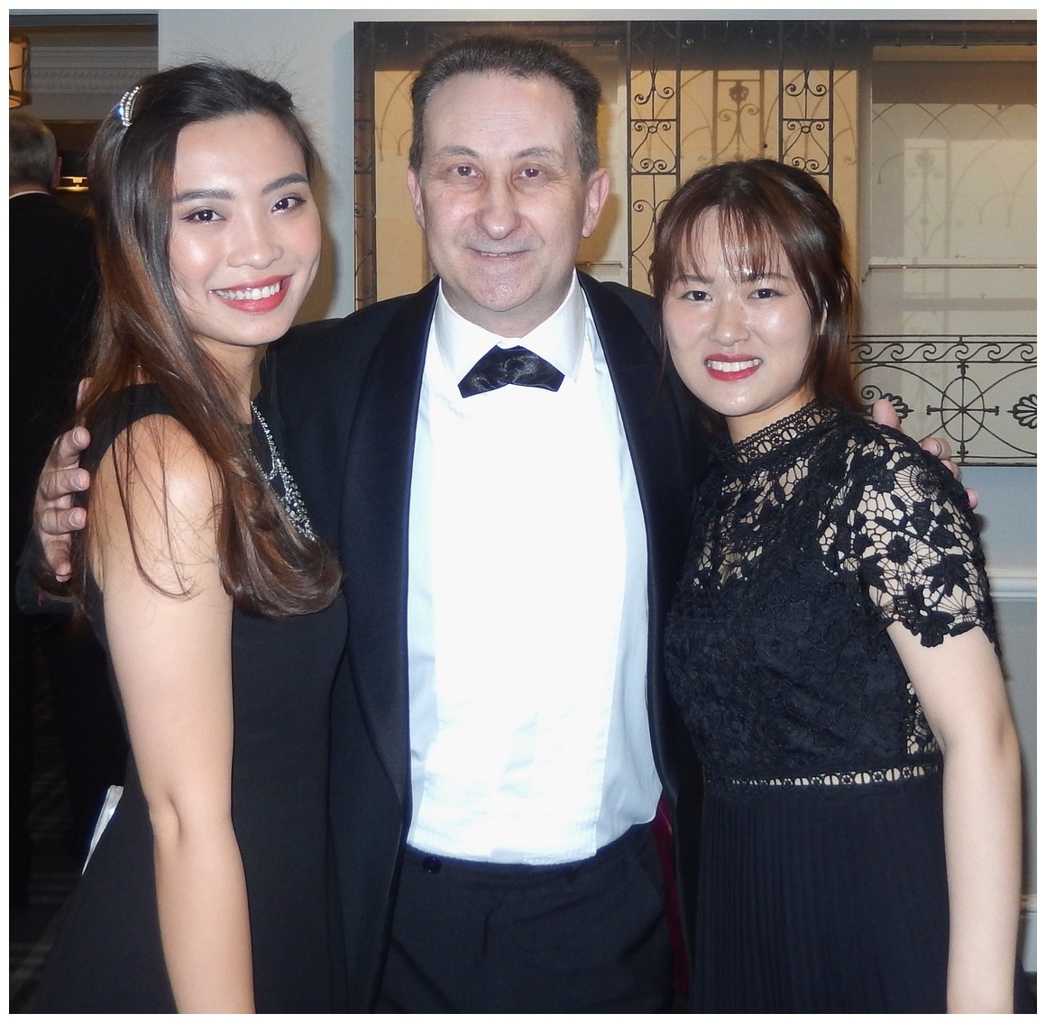 Andy Field Bristol Party Magician With Happy Event Guests Andy Field Bristol party magician with two guests after an interactive close-up magic performance