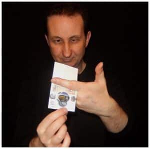 Andy Field performing a money trick at a Bristol wedding