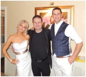Andy Field with a bride and groom at a wedding