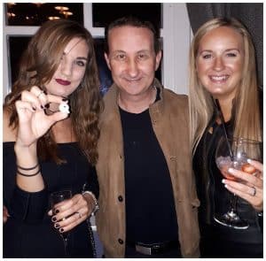 Andy Field Bristol party magician performing an interactive close-up magic trick with birthday party guests