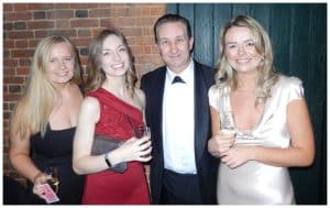 Andy Field with three guests after a close-up magic performance