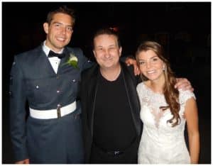 Andy Field with a bride and groom at a wedding