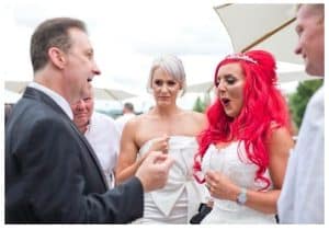 Andy Field performing close-up magic to a bride and groom