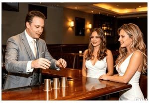 Precise timing during a Cups and Balls magic performance
