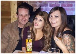 Party magician performing close-up magic for guests in Bristol
