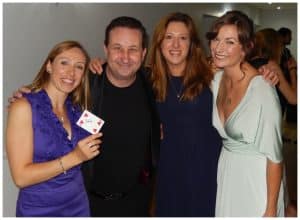 Andy Field impressing a group of women with close-up magic in Bristol