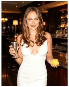 Lisa performing the Cups and Balls magic trick